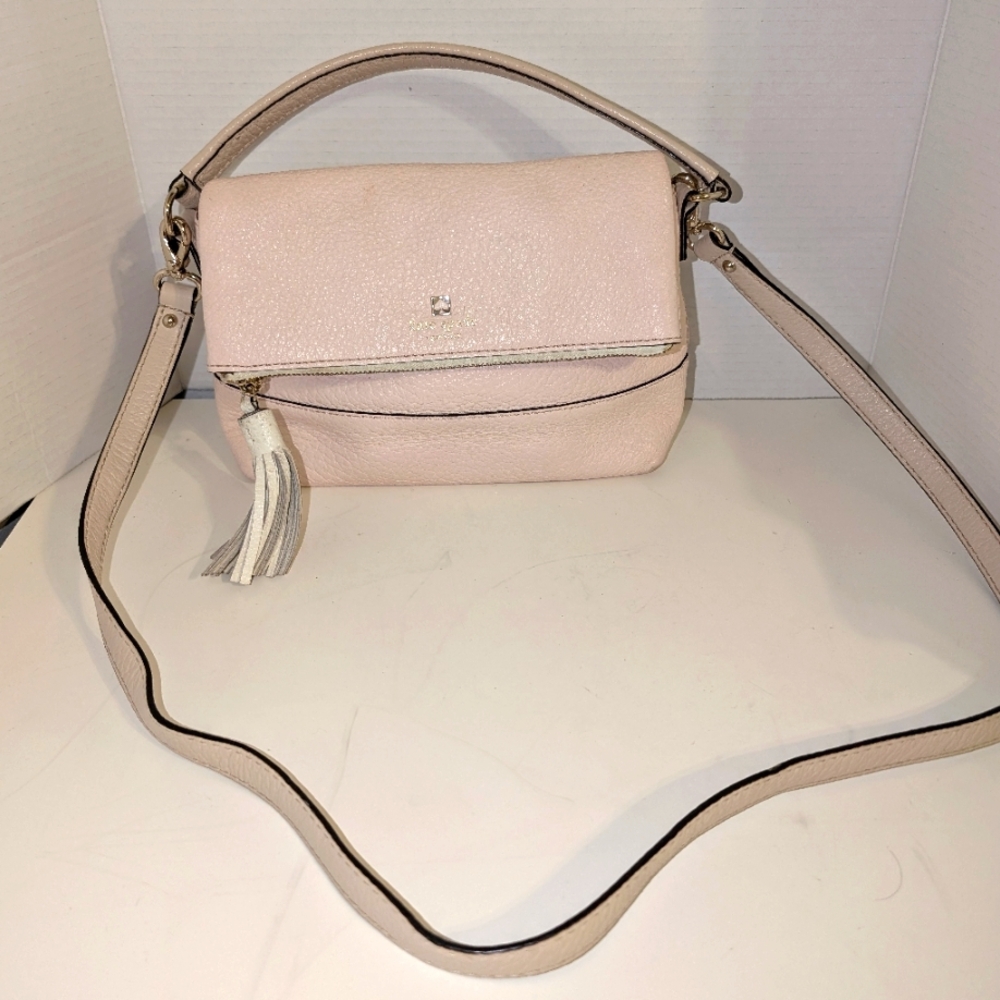 Kate Spade Cream Crossbody Bag with Minimalist Design